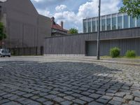 City Life in Berlin: Cobblestone Roads and Modern Architecture