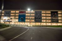 there's only one parking garage at this location with billboards on it and advertising is on the wall