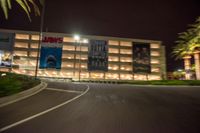 there's only one parking garage at this location with billboards on it and advertising is on the wall