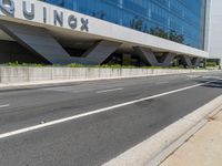 a woman walks past the equinx headquarters in atlanta, ga, on thursday, may 23, 2017