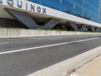 a woman walks past the equinx headquarters in atlanta, ga, on thursday, may 23, 2017