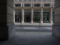 a clock is set at the corner of a building in this image, showing windows