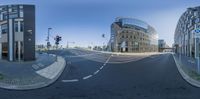 this is an image of a modern city street view taken from the inside out of a fish eye lens