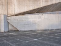 the white walls of the building are clad with wood panels and studdings that make it look like a wall