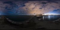 two panoramic shots taken of an ocean and city at night time, looking like the sun in another world