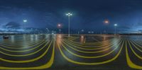 this is an image of street lights and a car park during the night time hours