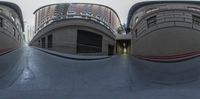 two fisheye photo of a skateboarder on a halfpipe in the city