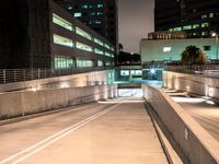 an empty parking garage with no people at night, in the middle of a city