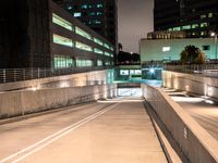 an empty parking garage with no people at night, in the middle of a city