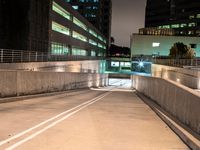 an empty parking garage with no people at night, in the middle of a city