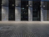City at Night: Lights Reflecting on Glass Buildings
