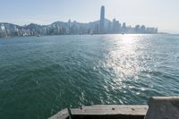there is a city that is on the water and on the shore and in front of the city