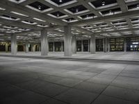 there is an empty building in a large room with some floors and lighting on it