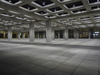 there is an empty building in a large room with some floors and lighting on it