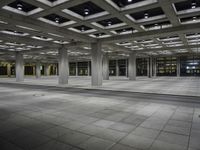 there is an empty building in a large room with some floors and lighting on it