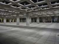 there is an empty building in a large room with some floors and lighting on it