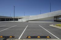 City Road: Asphalt and Parking Under Clear Skies