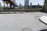 an image of a city from the curb as seen in a magazine advertisement of a sewer cover on a street
