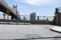 an image of a city from the curb as seen in a magazine advertisement of a sewer cover on a street