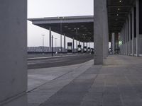 a photo with a picture of the side walk in the middle of town at the airport