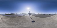 a panorama image of the city skyline from the top of a ramp on the freeway