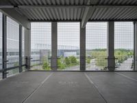 a photo taken from the inside out of an office building that has no walls, floor and window