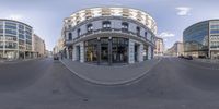 an image of a city street taken with fisheye lens cameras attached to the side