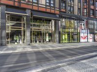 City Street in Berlin: A Mix of Shops and Modern Architecture