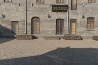 the person is walking down the street near old buildings on a sunny day with a red umbrella