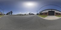 a picture of a city street taken with a fish eye lens and circular lens effect