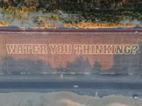 a city street with an overhead view of the slogan, stop being in the ditch