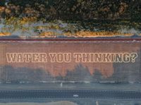 a city street with an overhead view of the slogan, stop being in the ditch