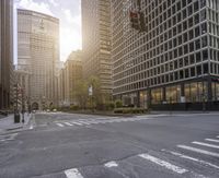 a city street is lined with buildings and street lights in front of skyscrapers and buildings