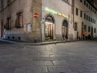 this is an empty city street in an italian city at night time to describe what's coming here