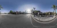 this is a photo of a street in a city, taken 360 - view looking out at a man