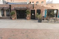 City Street: Urban Landscape with Brick Wall