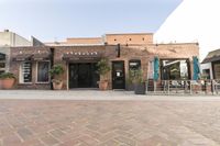 City Street: Urban Landscape with Brick Wall