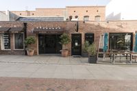 City Street: Urban Landscape with Brick Wall