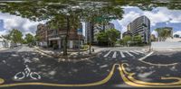 there is an image of a city street from a very fish eye lensed 360 - view