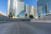 an empty cement walkway has been replaced from the road with concrete steps leading to the entrance