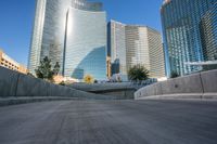 an empty cement walkway has been replaced from the road with concrete steps leading to the entrance