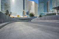 an empty cement walkway has been replaced from the road with concrete steps leading to the entrance