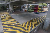 the yellow and black striped painted on the street curb is very unique looking and unique