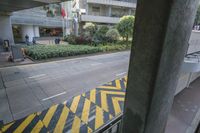 the yellow and black striped painted on the street curb is very unique looking and unique