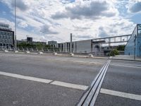 the side walk bridge crosses the city over a small highway, and goes through a pedestrian traffic