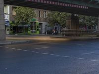 the view under the highway, on a rainy day of the city street and on the streets with buildings and bicycles