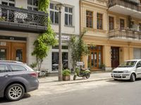 Cityscape in Berlin, Germany with Residential Apartments and Parked Vehicles