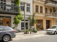 Cityscape in Berlin, Germany with Residential Apartments and Parked Vehicles