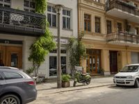 Cityscape in Berlin, Germany with Residential Apartments and Parked Vehicles