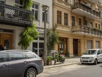 Cityscape in Berlin, Germany with Residential Apartments and Parked Vehicles